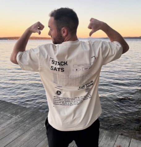 Speaker presenting in the lodge at Camp Nakamoto