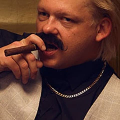 Robbie P performing with guitar